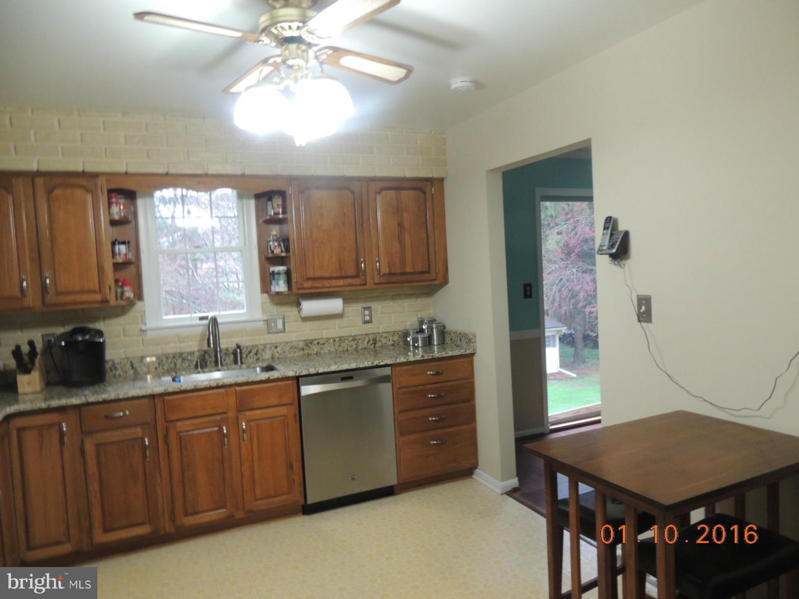 1130 Sturbridge Road Fallston, MD 21047 - Photo 10 of 29 a kitchen with a sink cabinets and wooden floor