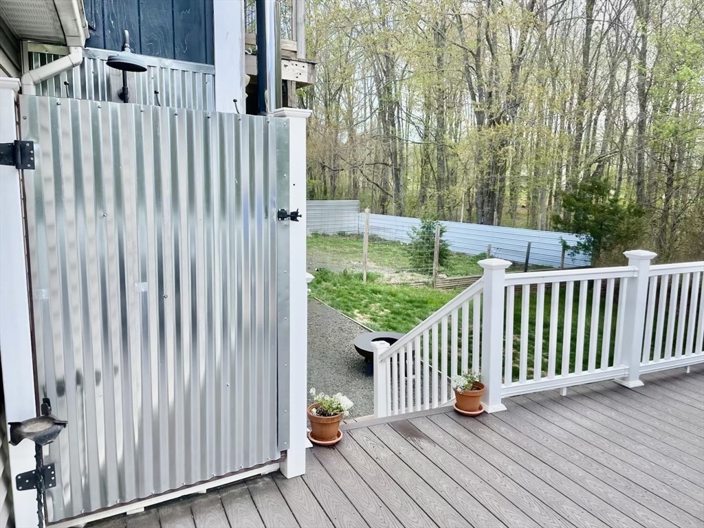 96 Cold Hill Granby, MA 01033 - Photo 13 of 42 a view of a balcony with wooden floor