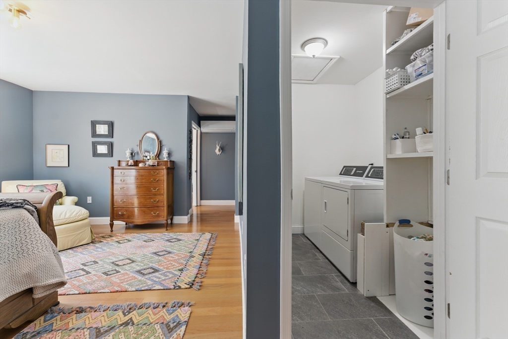 96 Cold Hill Granby, MA 01033 - Photo 16 of 42 a bedroom with furniture and a wooden floor
