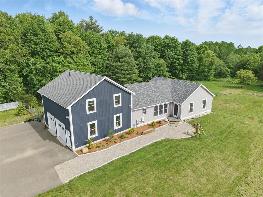 96 Cold Hill Granby, MA 01033 - Photo 2 of 42 an aerial view of residential house with yard and trees in the background