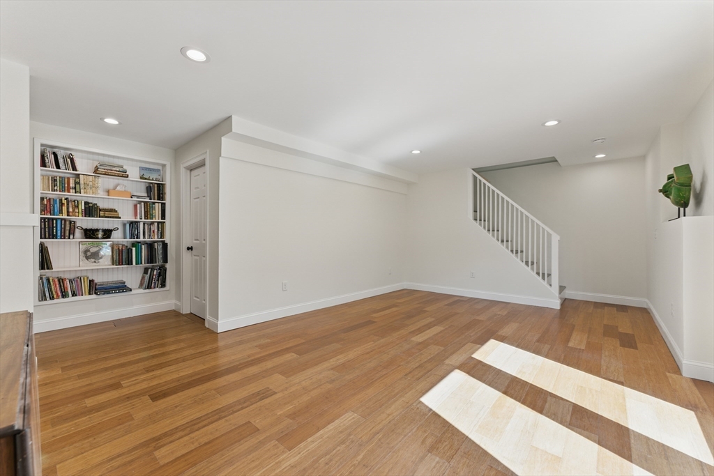 96 Cold Hill Granby, MA 01033 - Photo 22 of 42 a view of an empty room with wooden floor and entryway