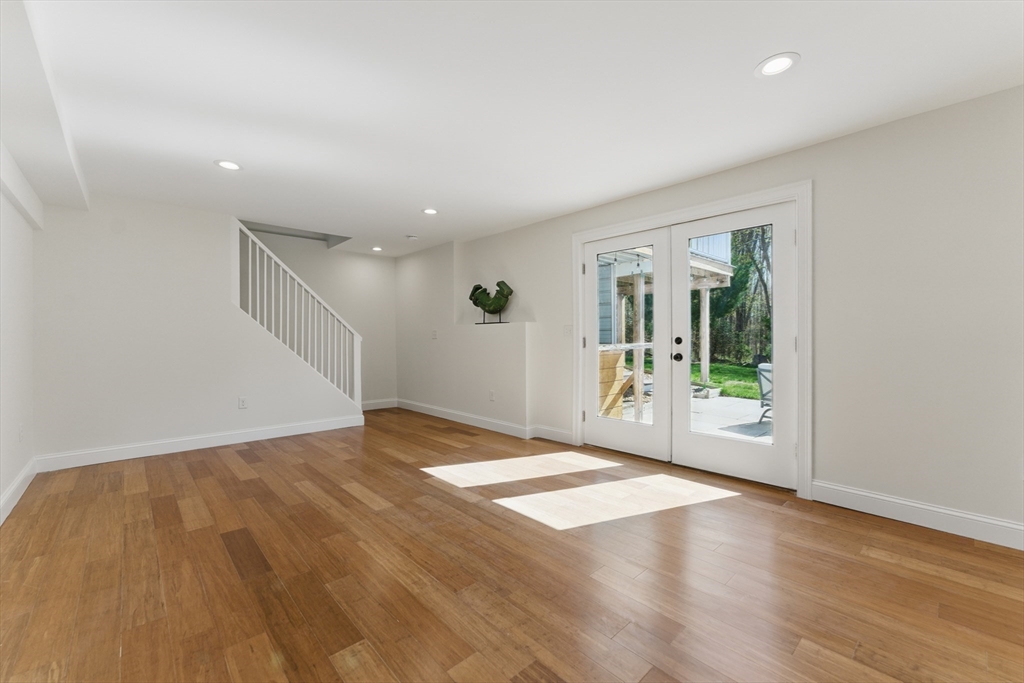 96 Cold Hill Granby, MA 01033 - Photo 26 of 42 a view of an empty room with wooden floor and a window