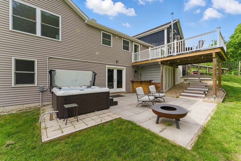 96 Cold Hill Granby, MA 01033 - Photo 28 of 42 a view of a backyard with sitting area