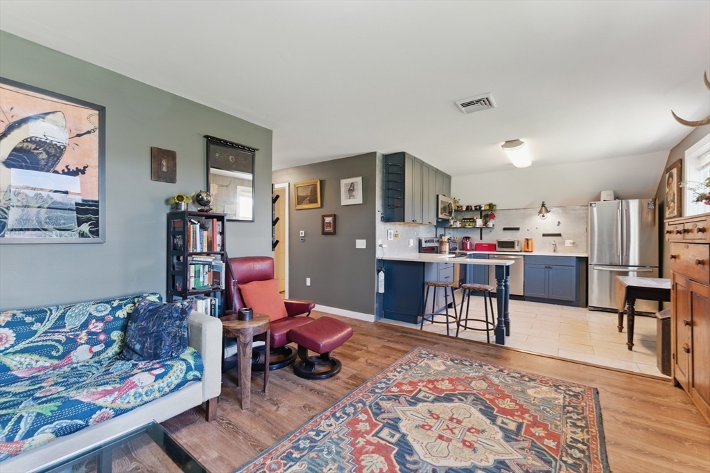 96 Cold Hill Granby, MA 01033 - Photo 34 of 42 a living room with furniture and view of kitchen