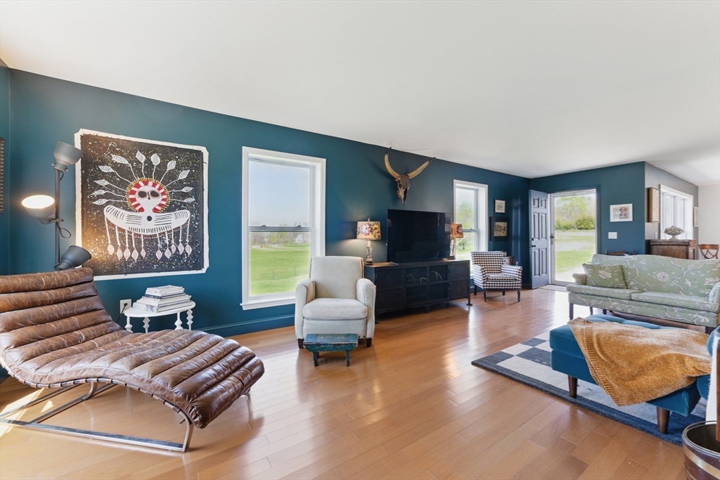 96 Cold Hill Granby, MA 01033 - Photo 5 of 42 a living room with furniture and a flat screen tv