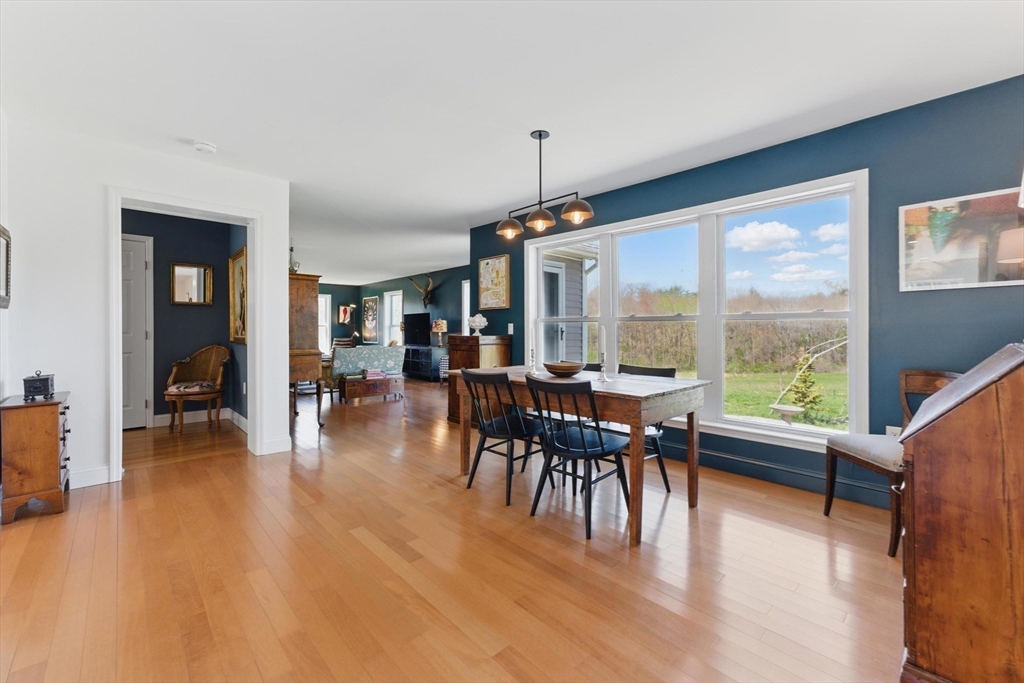 96 Cold Hill Granby, MA 01033 - Photo 7 of 42 a dining room with furniture window wooden floor