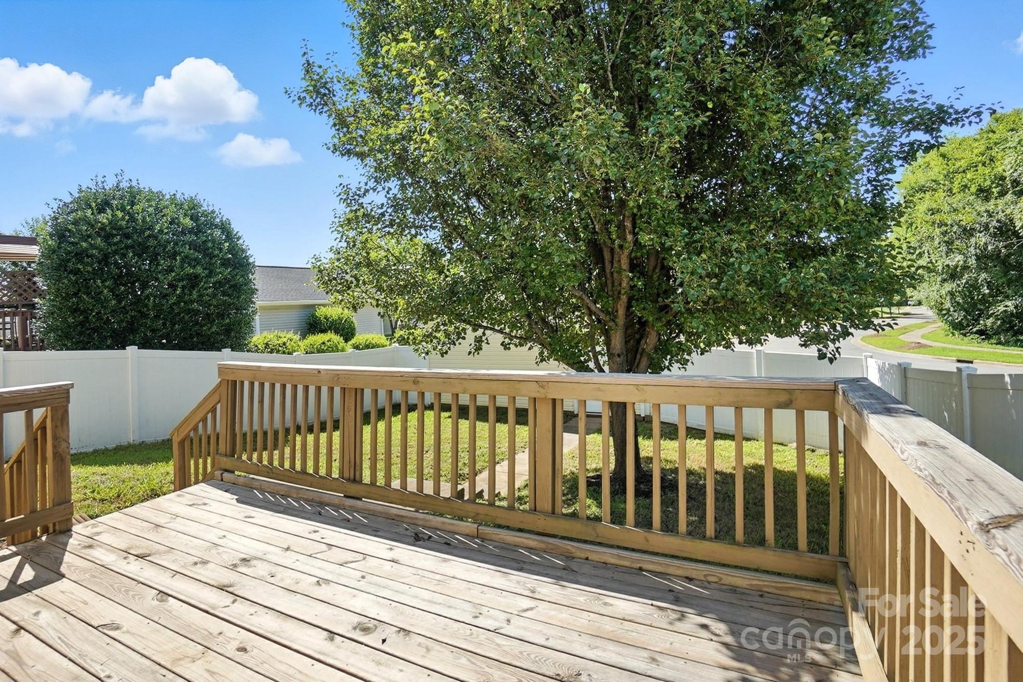 8710 Arrowhead Pl Lane Cornelius, NC 28031 - Photo 40 of 48 a view of balcony with wooden floor and fence
