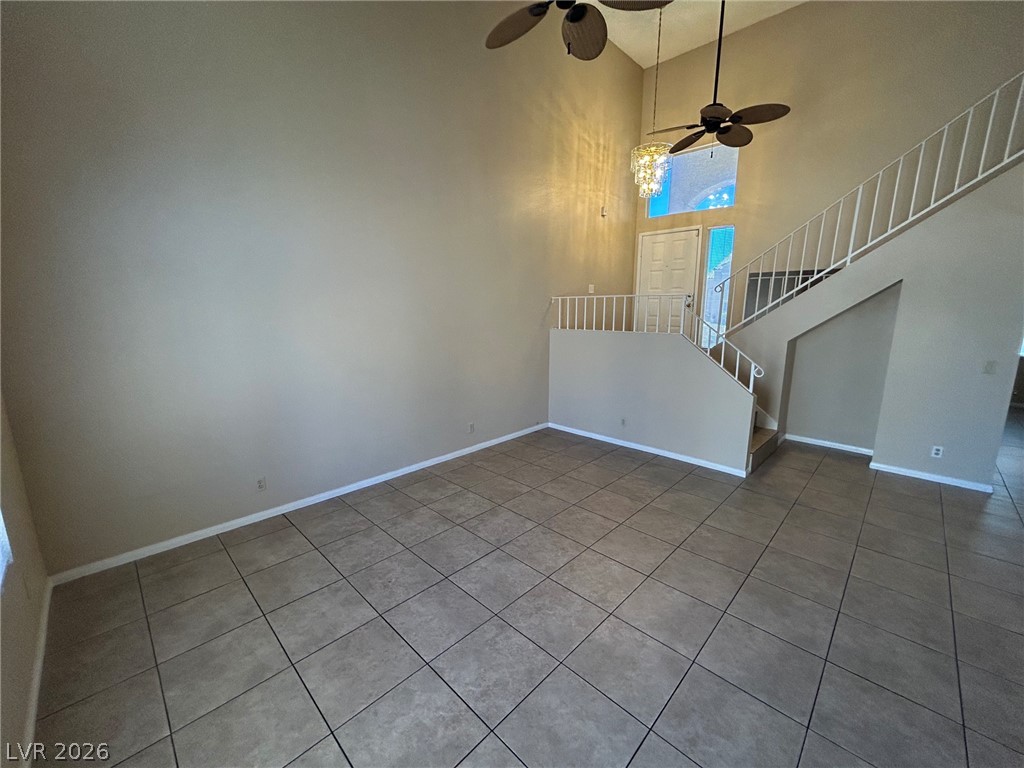2806 Rungsted Street Las Vegas, NV 89142 - Photo 6 of 18 High ceilings and a grand staircase define this generous entry space.