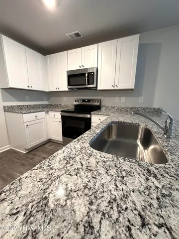 $1,900 | 1139 Spadefish Drive Northwest, Unit LOT 146 WOODHAVEN, Sunset Beach, NC 28468