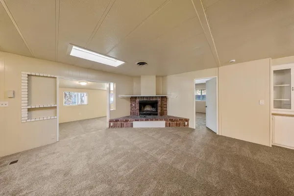 a view of a livingroom with a fireplace