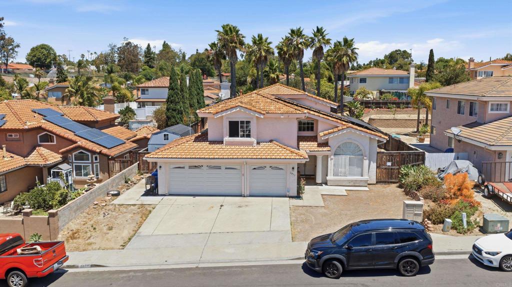 2077 Westwood Road Vista, CA 92083 - Photo 1 of 37 an aerial view of a house with parking space
