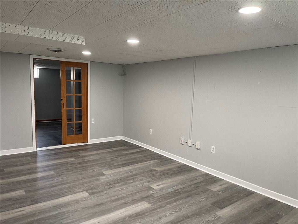 1361 Sussex Road Troy, OH 45373 - Photo 24 of 25 This versatile basement space features durable flooring and ample lighting.