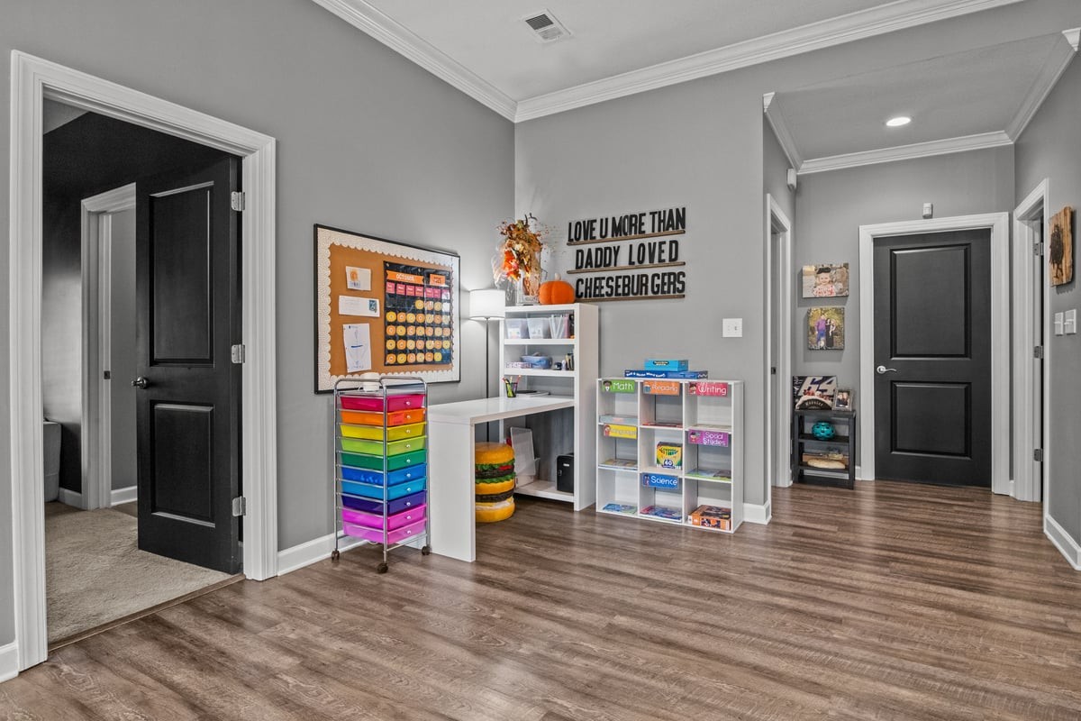 3950 Budds Creek Road Palmyra, TN 37142 - Photo 14 of 54 a view of an empty room with wooden floor and a window