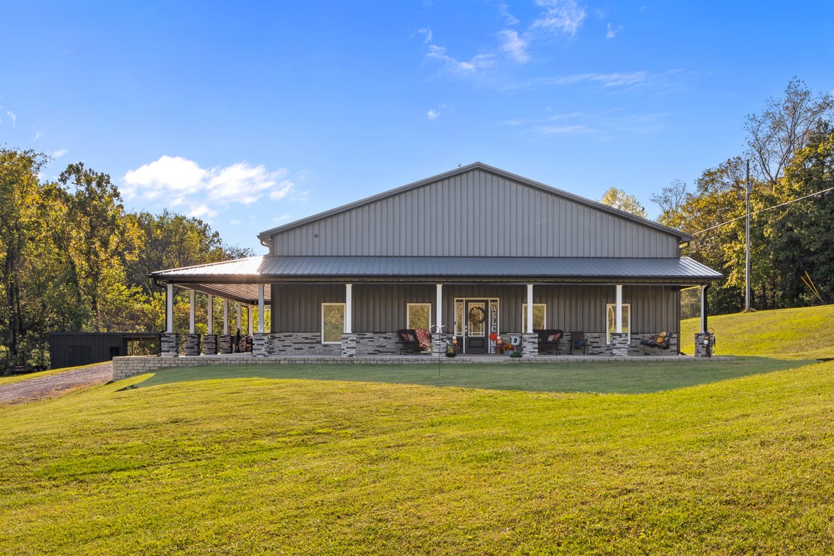 3950 Budds Creek Road Palmyra, TN 37142 - Photo 2 of 54 a front view of house with swimming pool