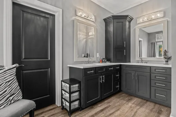 a bathroom with a bathtub and a shower