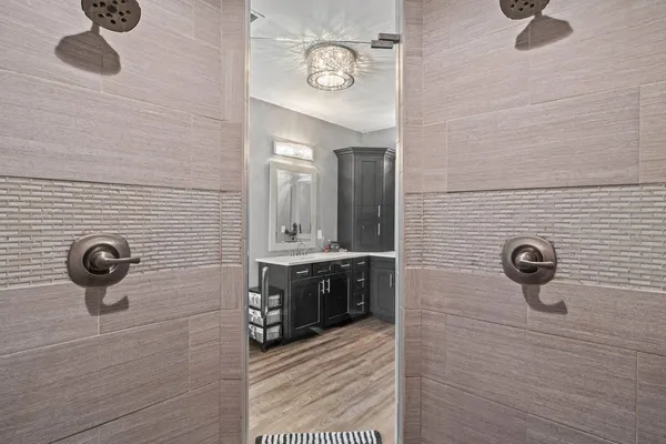 a view of a sink and a window