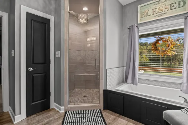 a bedroom with a bed and a table