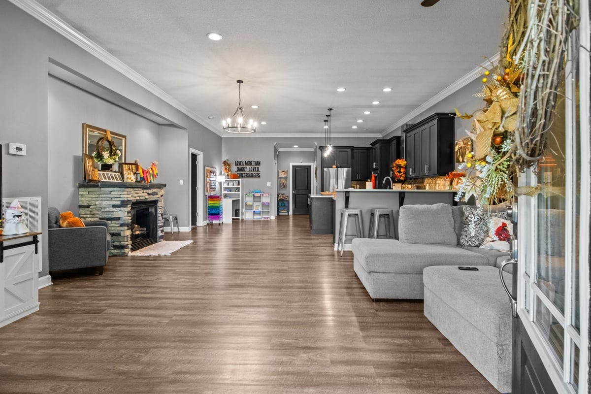3950 Budds Creek Road Palmyra, TN 37142 - Photo 3 of 54 a living room with furniture and a flat screen tv