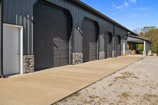 a view of a yard with an outdoor space