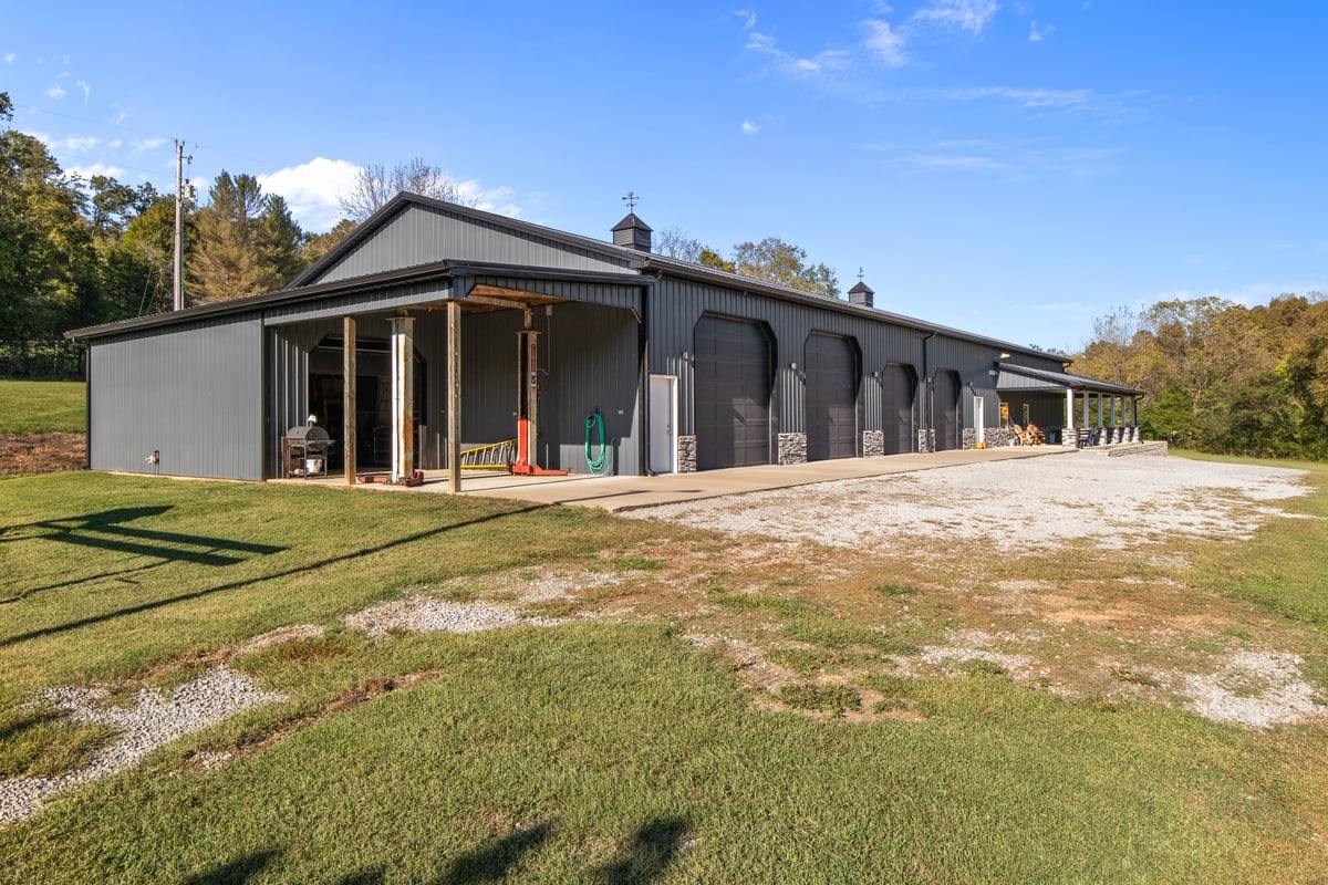3950 Budds Creek Road Palmyra, TN 37142 - Photo 42 of 54 a view of a house with a outdoor space