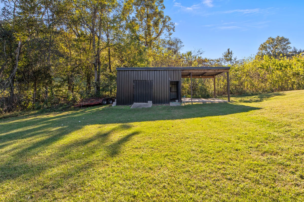3950 Budds Creek Road Palmyra, TN 37142 - Photo 45 of 54 a view of a yard with an outdoor space