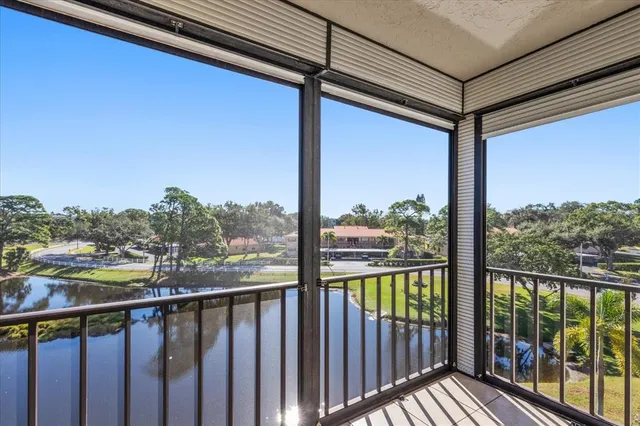a view of a balcony with city view