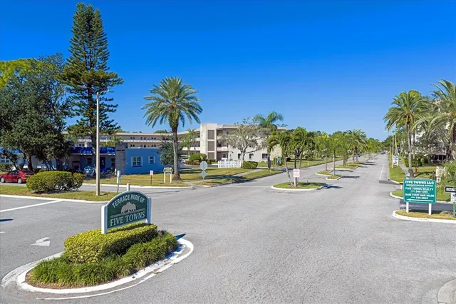 a view of swimming pool with outdoor seating and yard