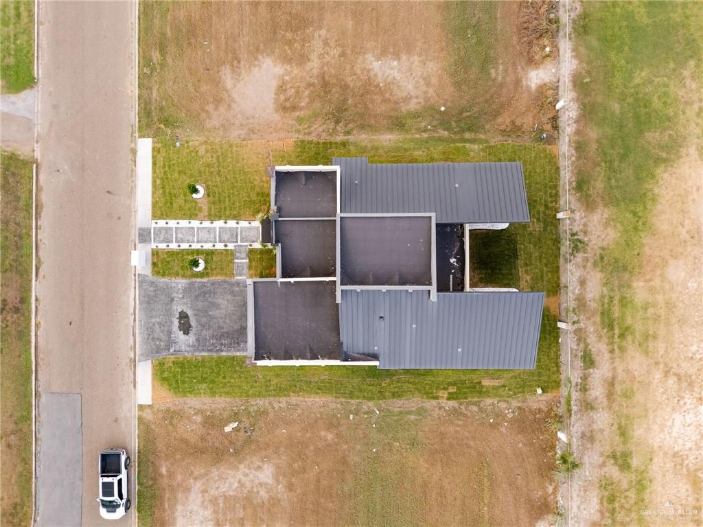 1402 Tierra Encantada Weslaco, TX 78596 - Photo 28 of 29 a view of outdoor space yard and swimming pool