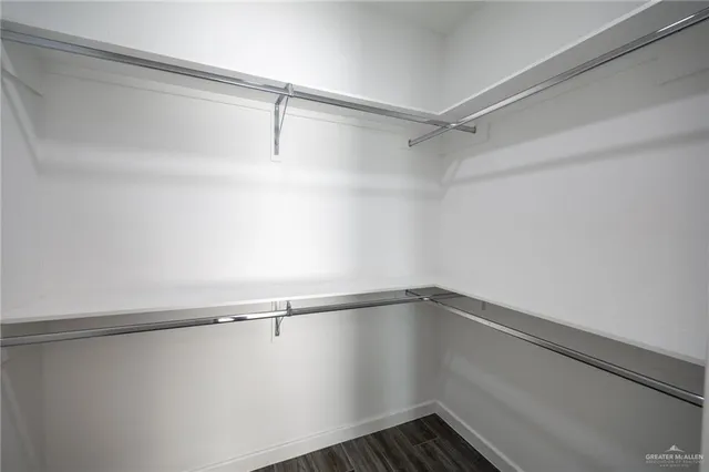 a view of an empty walk in closet