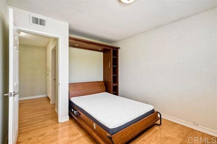 635 Boysenberry Way Oceanside, CA 92057 - Photo 12 of 21 a room with a bed and a view of bathroom