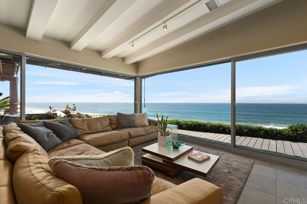 226 5th Street Encinitas, CA 92024 - Photo 3 of 45 a living room with furniture and floor to ceiling window