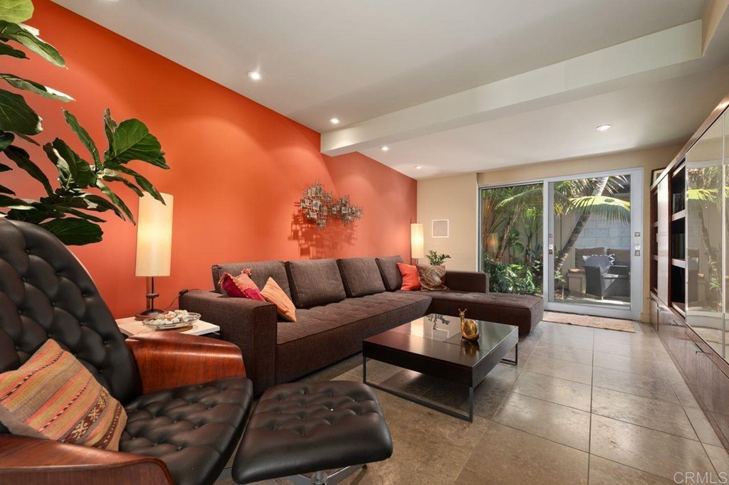 226 5th Street Encinitas, CA 92024 - Photo 21 of 45 a living room with furniture and a large window