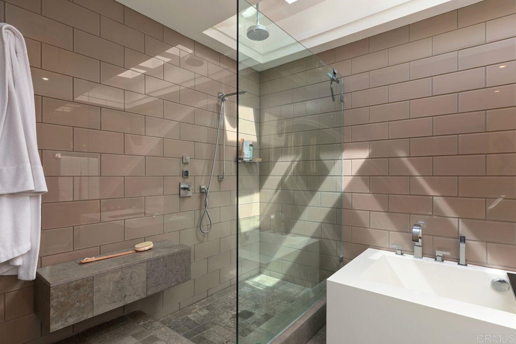 226 5th Street Encinitas, CA 92024 - Photo 25 of 45 a bathroom with a sink and shower