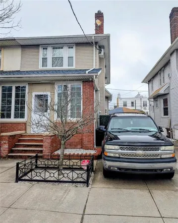 a car parked in front of a building