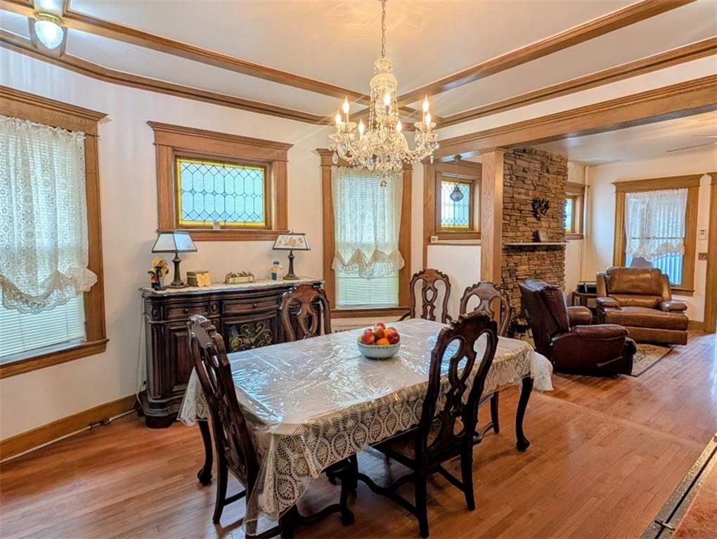 1735 West 11th Street Brooklyn, NY 11223 - Photo 4 of 14 a view of a dining room with furniture window and wooden floor