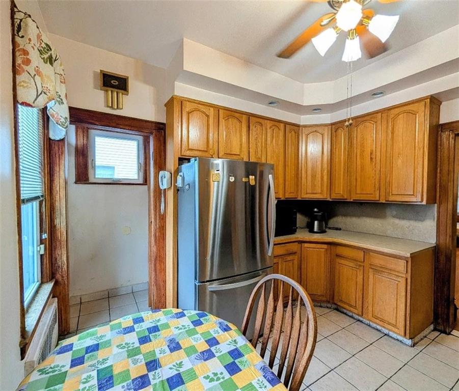 1735 West 11th Street Brooklyn, NY 11223 - Photo 6 of 14 a kitchen with stainless steel appliances granite countertop a refrigerator a sink and dishwasher