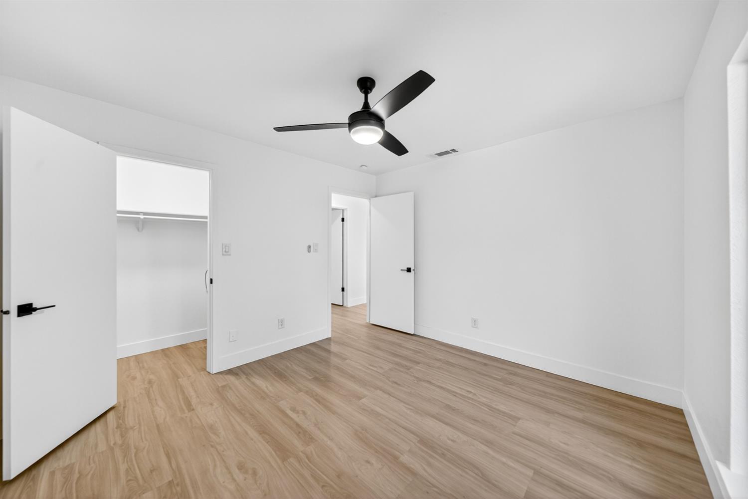 18578 Farallon Road Madera, CA 93638 - Photo 18 of 29 wooden floor in an empty room