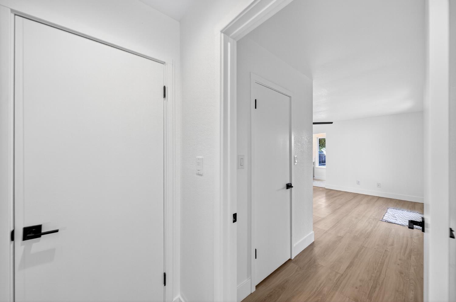 18578 Farallon Road Madera, CA 93638 - Photo 20 of 29 a view of a hallway with wooden floor