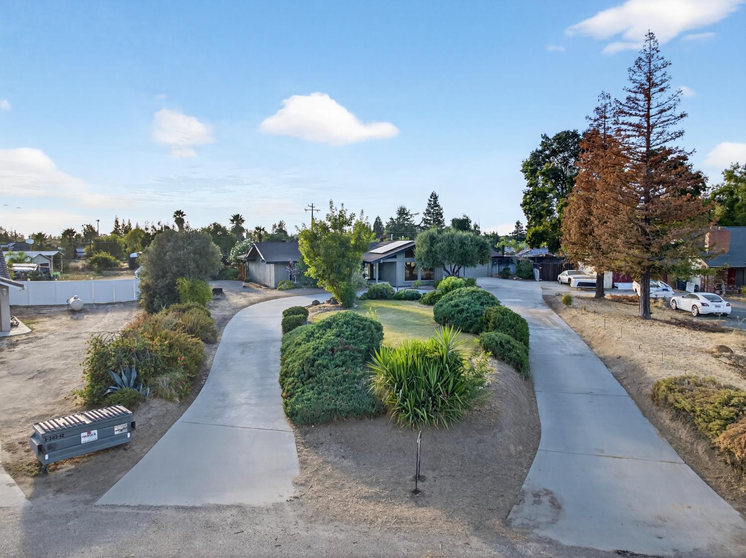 18578 Farallon Road Madera, CA 93638 - Photo 4 of 29 a view of a park with cars parked
