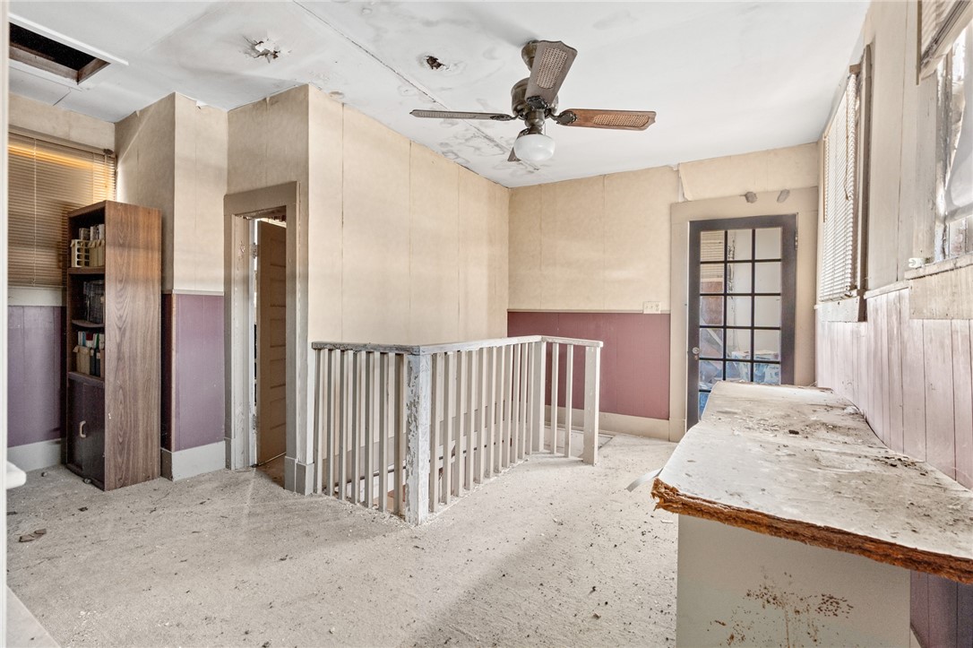 306 East Adams Street Itasca, TX 76055 - Photo 19 of 29 a view of a hallway to a bedroom