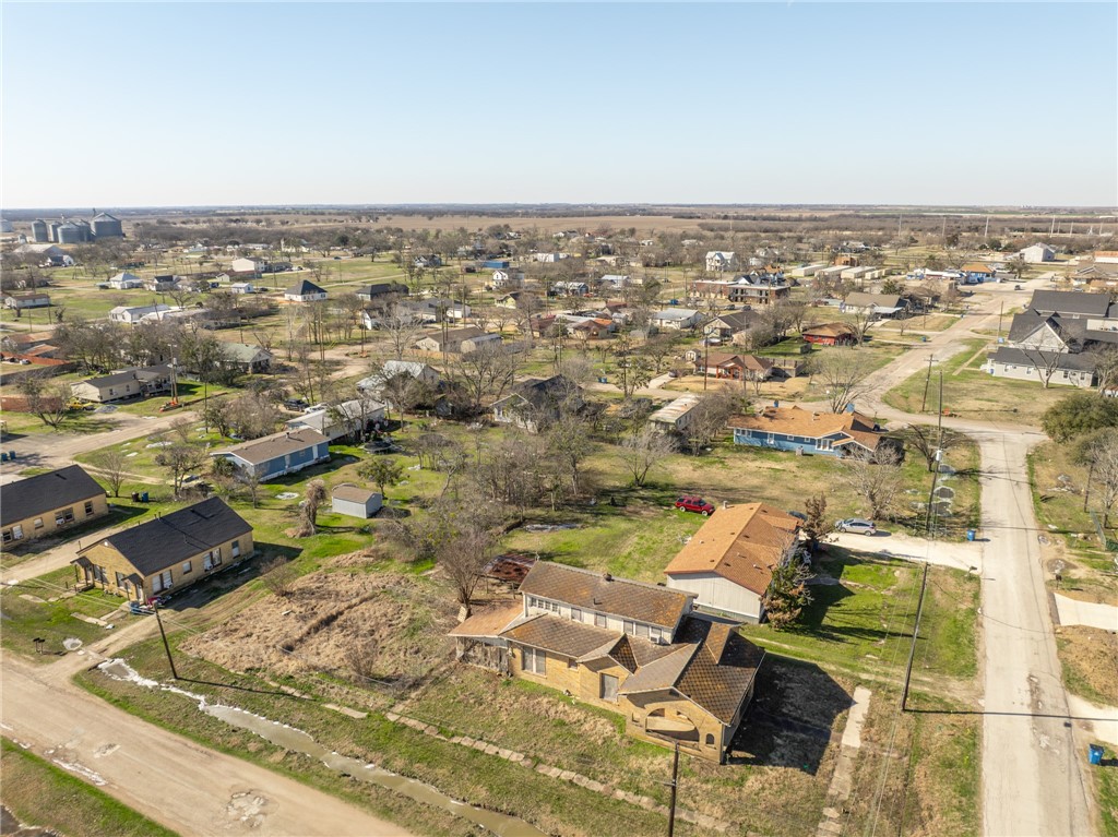 306 East Adams Street Itasca, TX 76055 - Photo 29 of 29 an aerial view of residential houses with outdoor space