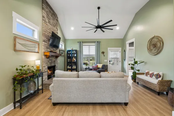 a living room with furniture and a window