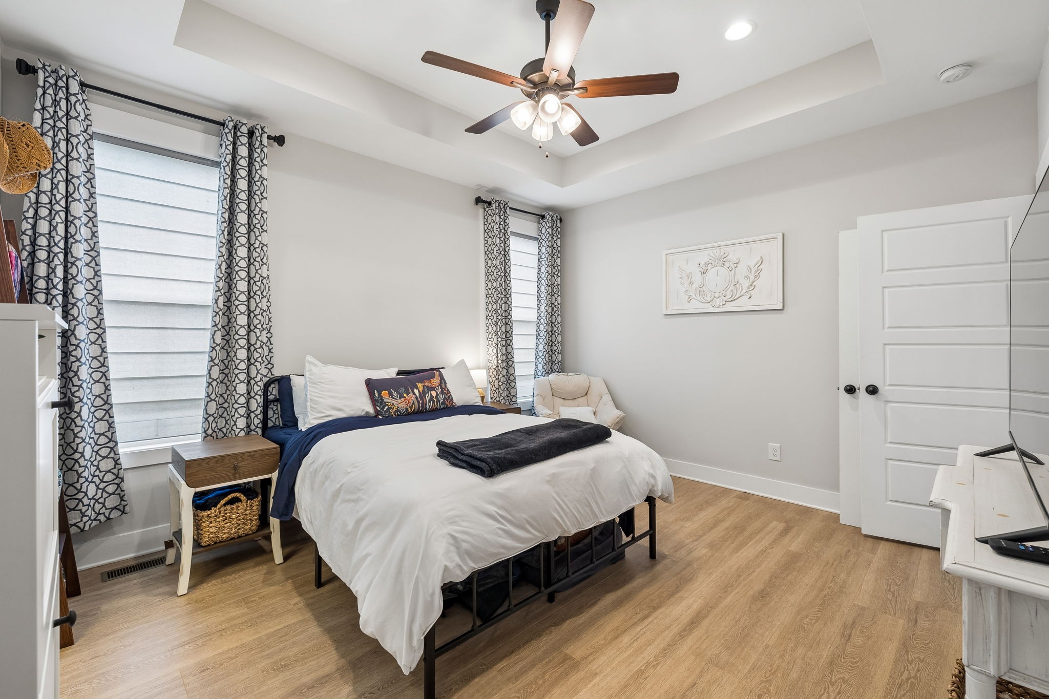 126 Julia Ann Court Springfield, TN 37172 - Photo 19 of 37 a bedroom with a bed chandelier and a window