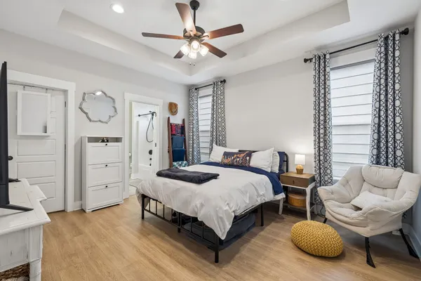 a bedroom with a bed and furniture