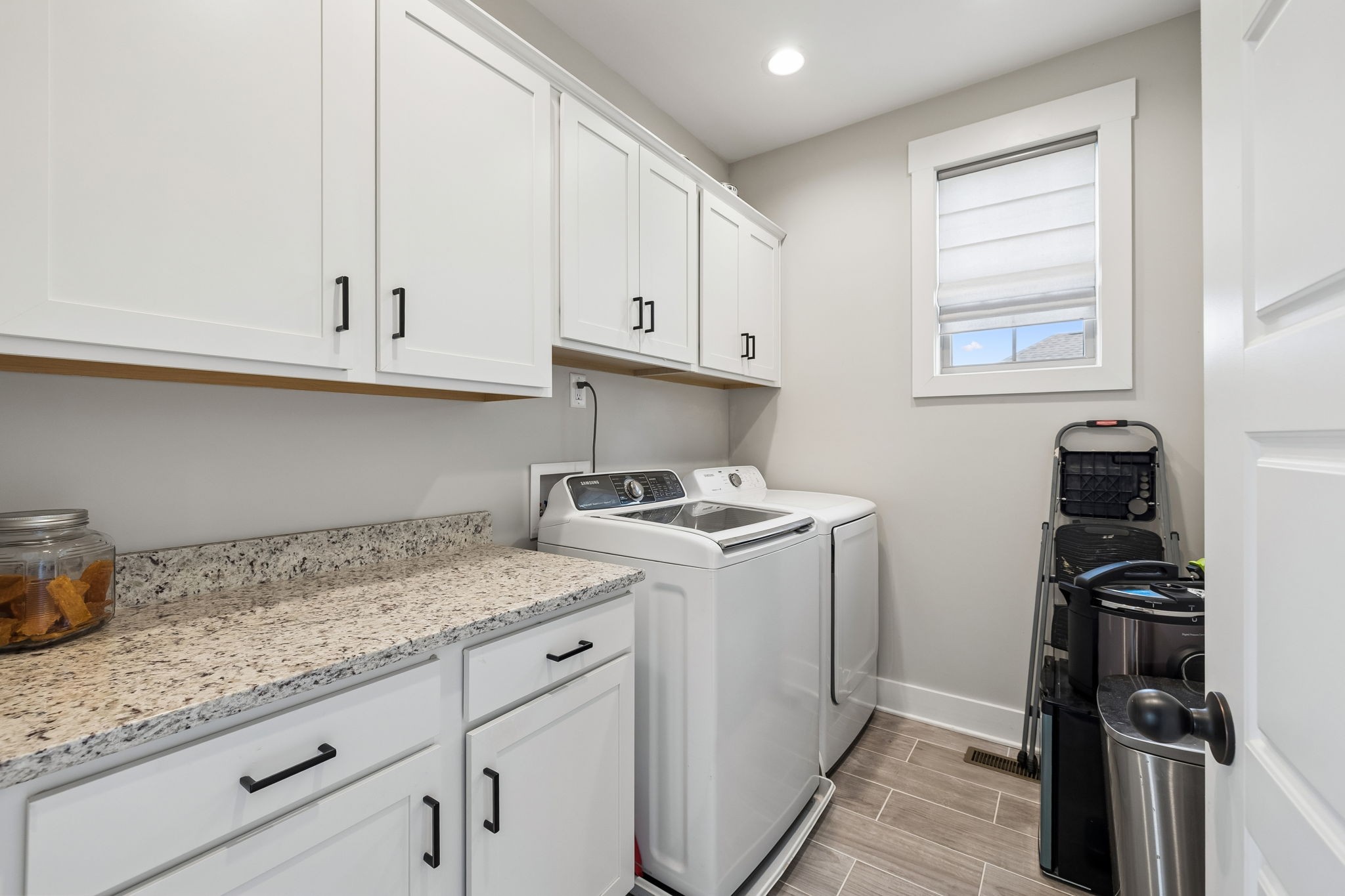 126 Julia Ann Court Springfield, TN 37172 - Photo 27 of 37 a kitchen with a sink stove and cabinets