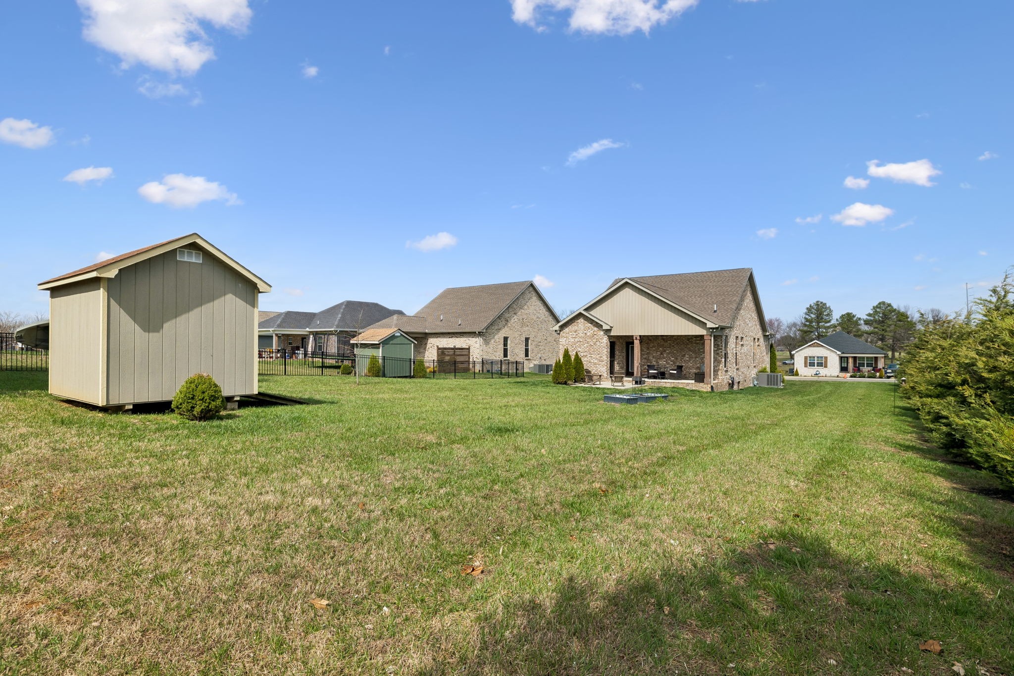 126 Julia Ann Court Springfield, TN 37172 - Photo 32 of 37 a view of a house with backyard and garden