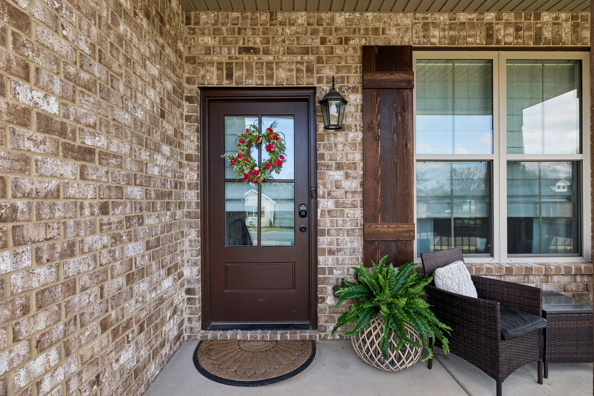 126 Julia Ann Court Springfield, TN 37172 - Photo 5 of 37 a potted plant sitting in front of a house