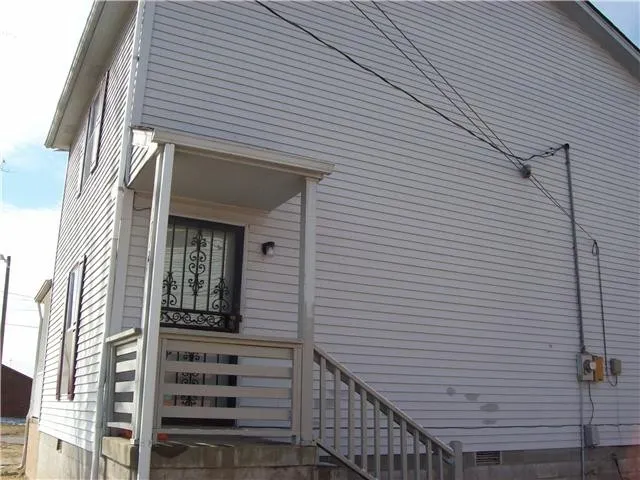 a view of a brick house with a door