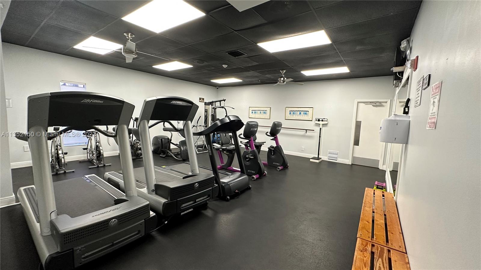 250 Gate Road, Unit 258 Hollywood, FL 33024 - Photo 26 of 30 a view of a room with gym equipment