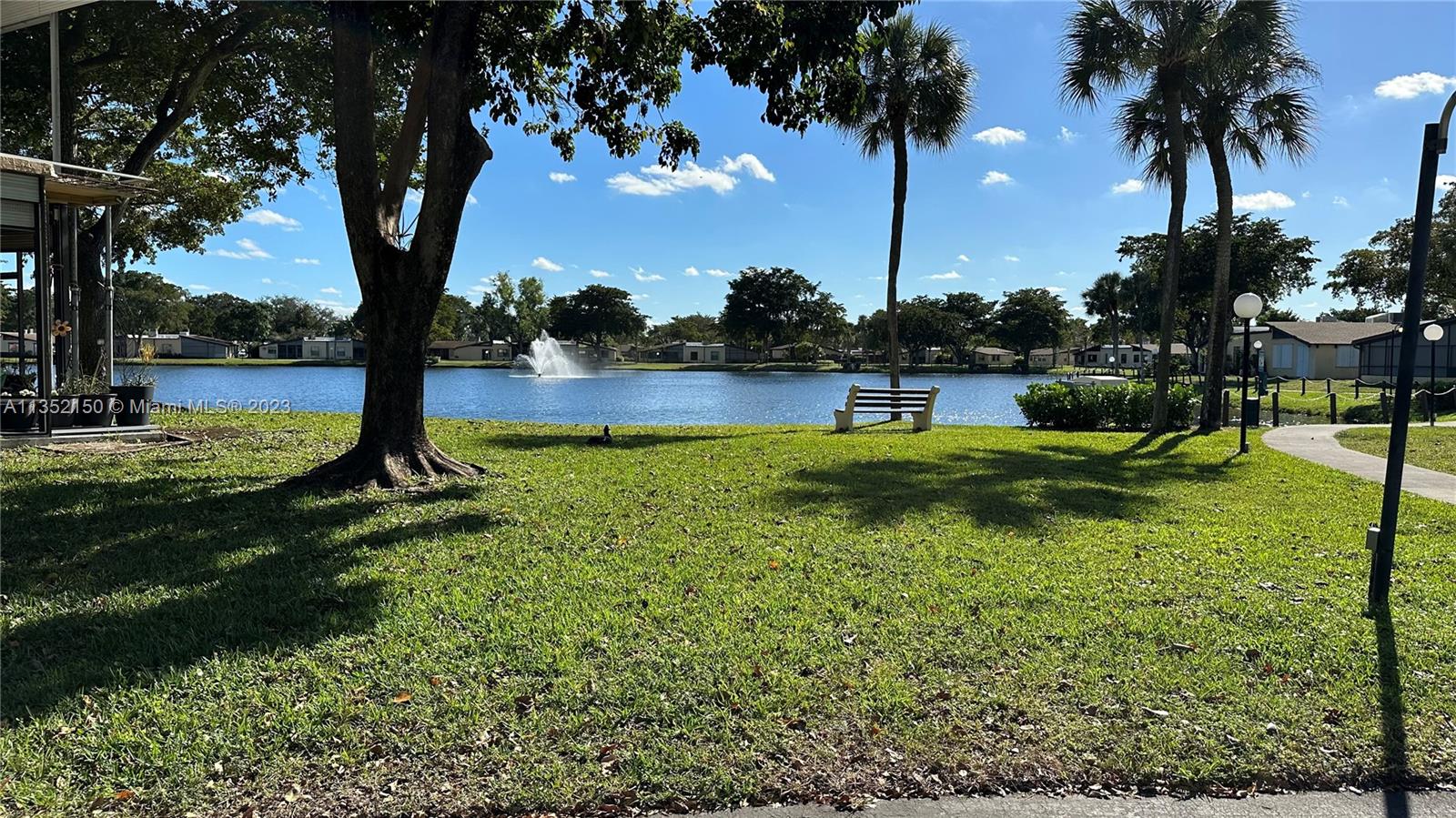250 Gate Road, Unit 258 Hollywood, FL 33024 - Photo 30 of 30 a view of a park with a tree